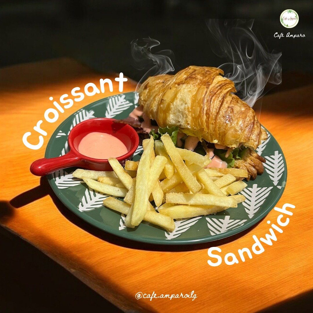 Cafe Amparo's Croissant sandwich with fries and dip.